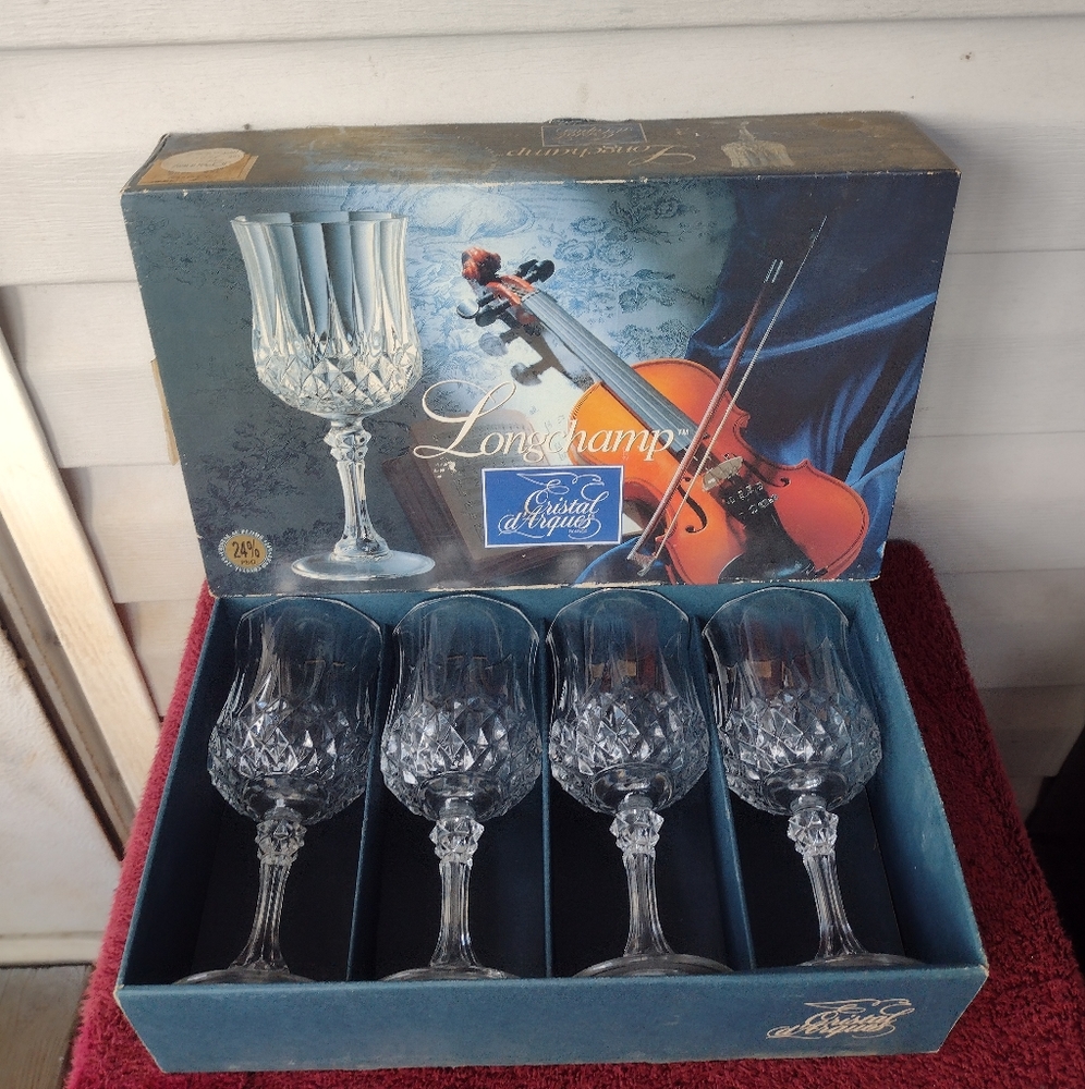 A set of 4-7 1/2oz Cristal D'Arques Longchamp stemmed crystal goblets
